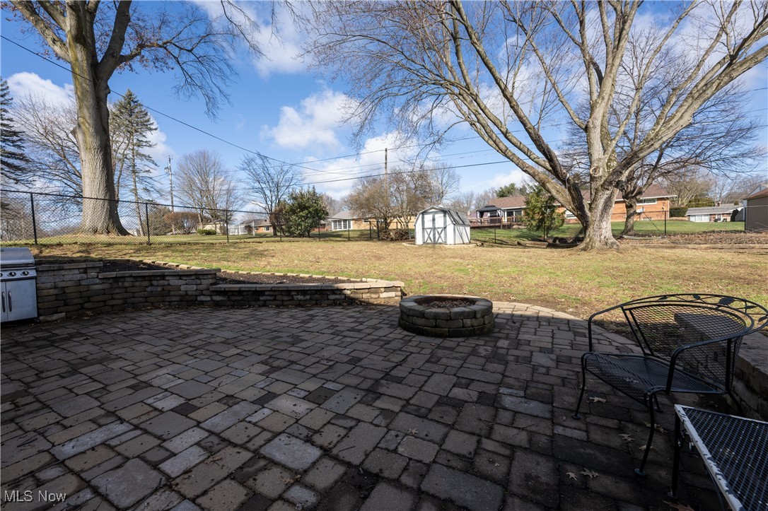 3721 20th Street Northwest Canton, OH 44708 - Photo 36 of 47 View of patio / terrace featuring an outdoor fire pit and a shed