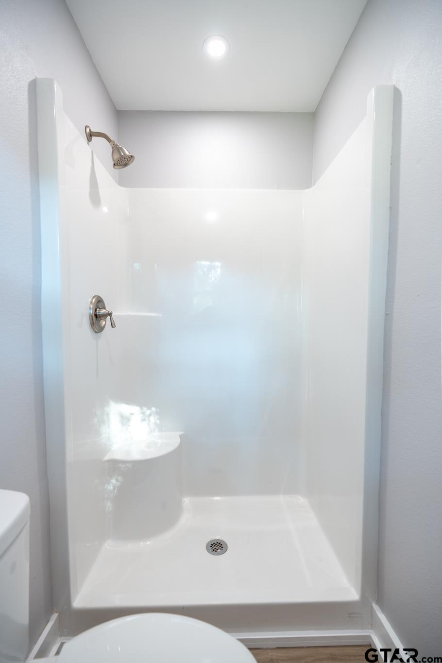 2922 West Azalea Drive Tyler, TX 75701 - Photo 28 of 39 a bathroom with a shower