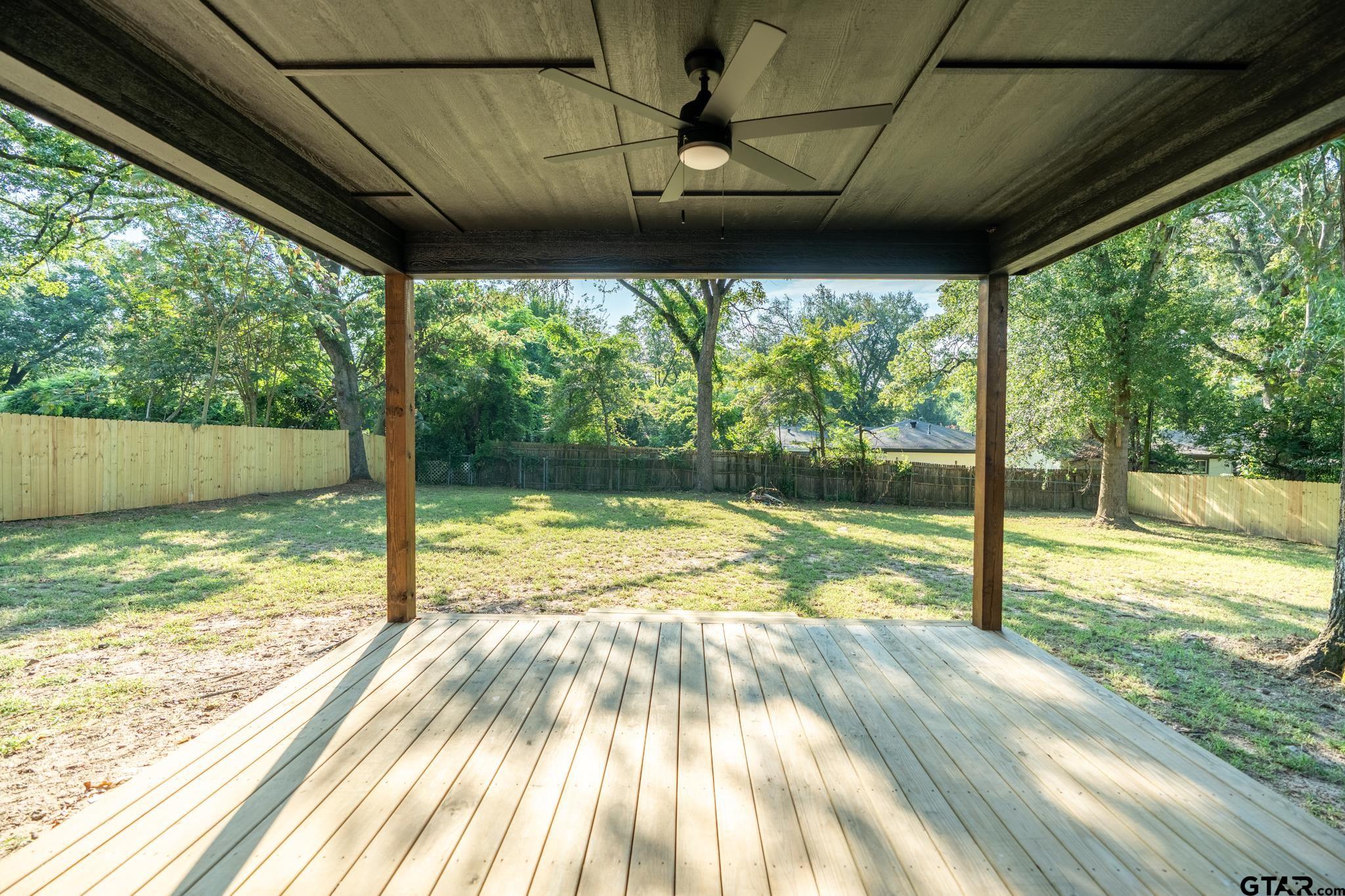 2922 West Azalea Drive Tyler, TX 75701 - Photo 31 of 39 a view of a room with wooden floor and a porch