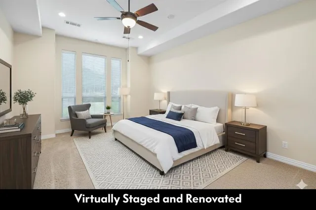 a bedroom with a bed window and a couch