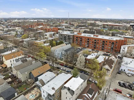 an aerial view of a city with lots of residential buildings
