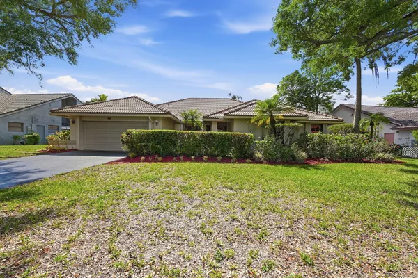 $690,000 | 5055 Northwest 89th Way, Coral Springs, FL 33067