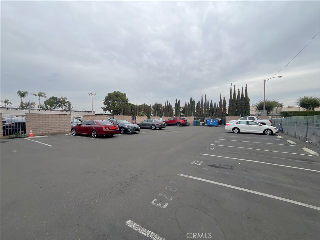 12926 Doty Avenue, Unit 9 Hawthorne, CA 90250 - Photo 11 of 12 a view of a city street with parked cars