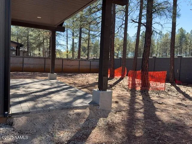 a view of a backyard of a house