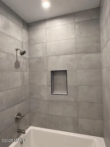 a bathroom with a bathtub