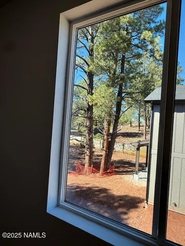 a view of swimming pool with a patio