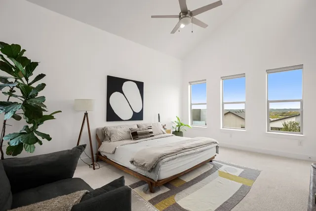 a bathroom with a sink toilet and mirror