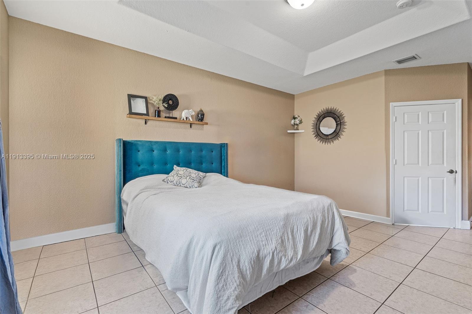 211 Southwest 15th Terrace Homestead, FL 33030 - Photo 20 of 26 a bedroom with a bed and a window