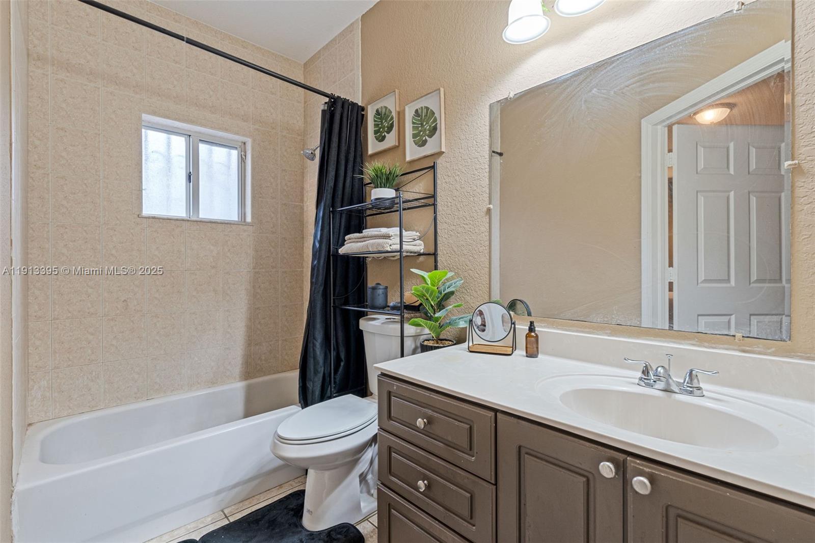 211 Southwest 15th Terrace Homestead, FL 33030 - Photo 21 of 26 a bathroom with a granite countertop sink toilet and shower