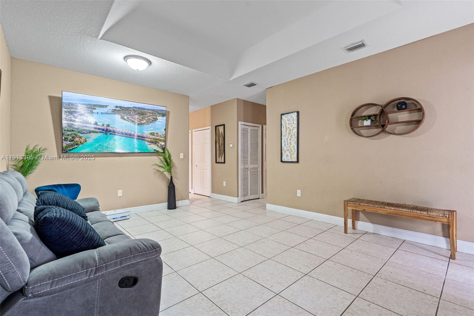 211 Southwest 15th Terrace Homestead, FL 33030 - Photo 5 of 26 a living room with furniture and a couch