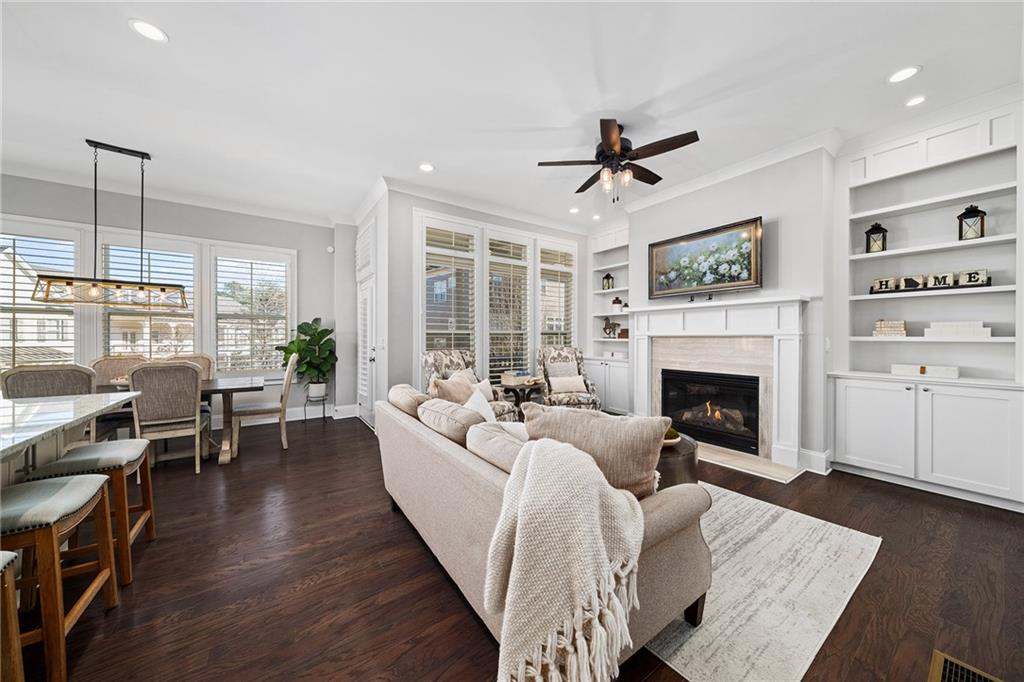 165 Rowan Avenue Alpharetta, GA 30009 - Photo 13 of 84 a living room with furniture fireplace and window