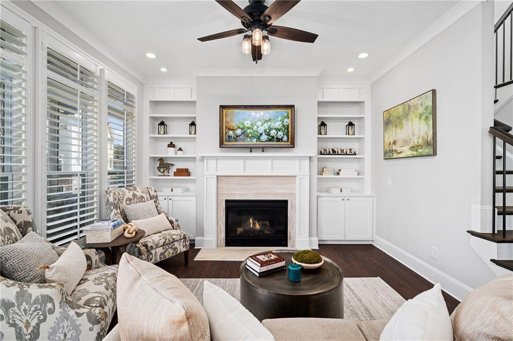165 Rowan Avenue Alpharetta, GA 30009 - Photo 14 of 84 a living room with furniture and a fireplace