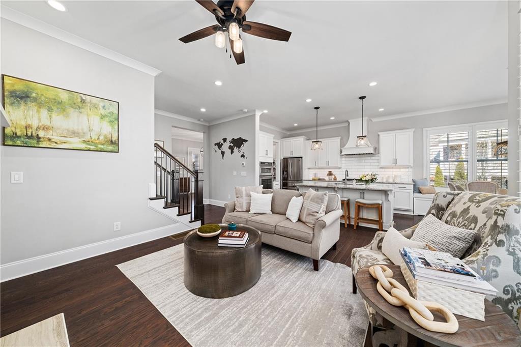 165 Rowan Avenue Alpharetta, GA 30009 - Photo 17 of 84 a living room with furniture and kitchen view