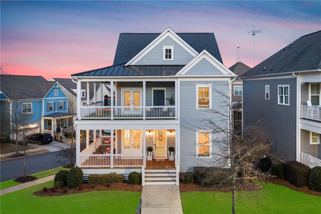165 Rowan Avenue Alpharetta, GA 30009 - Photo 2 of 84 a front view of a house with a yard