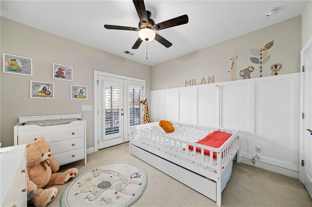 165 Rowan Avenue Alpharetta, GA 30009 - Photo 39 of 84 a bedroom with a bed and a window