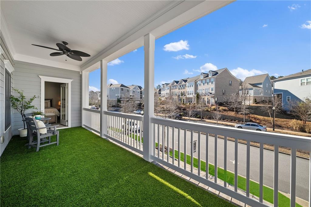 165 Rowan Avenue Alpharetta, GA 30009 - Photo 42 of 84 a view of a porch with furniture and a yard