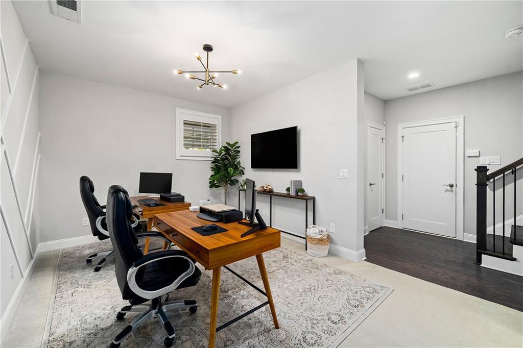 165 Rowan Avenue Alpharetta, GA 30009 - Photo 49 of 84 a workspace with furniture and a rug