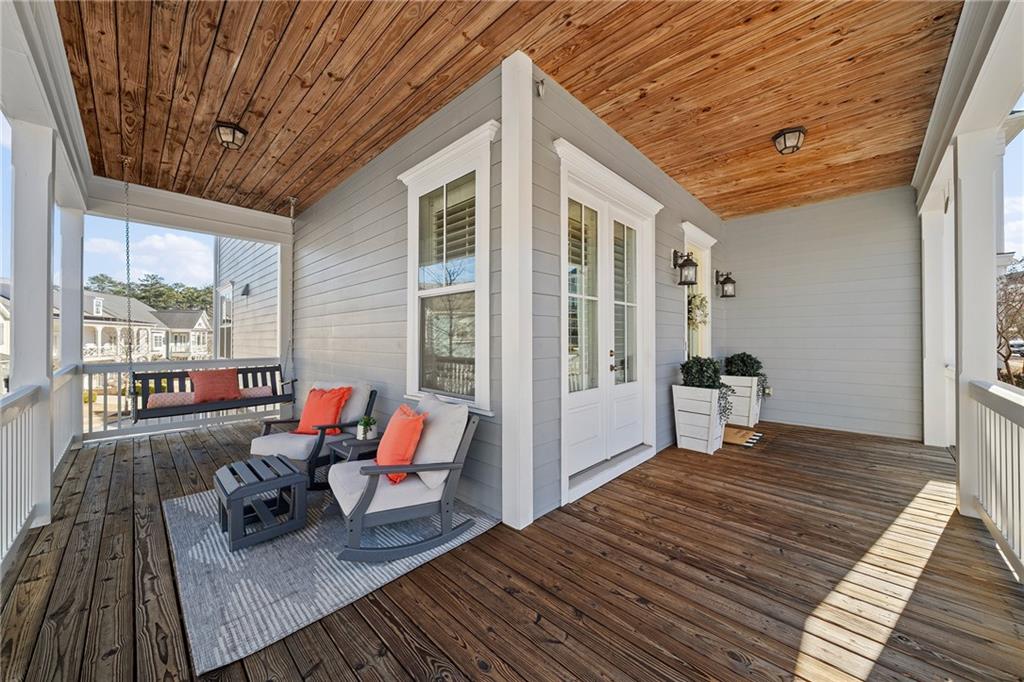 165 Rowan Avenue Alpharetta, GA 30009 - Photo 5 of 84 a living room with furniture and wooden floor