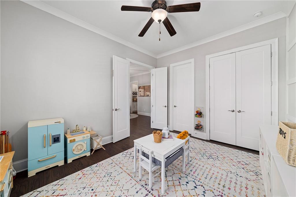 165 Rowan Avenue Alpharetta, GA 30009 - Photo 10 of 84 a living room with furniture and a rug