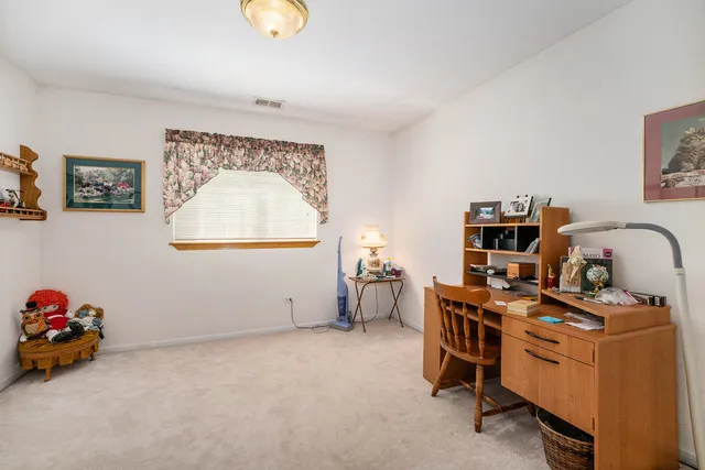 a room with furniture and a window