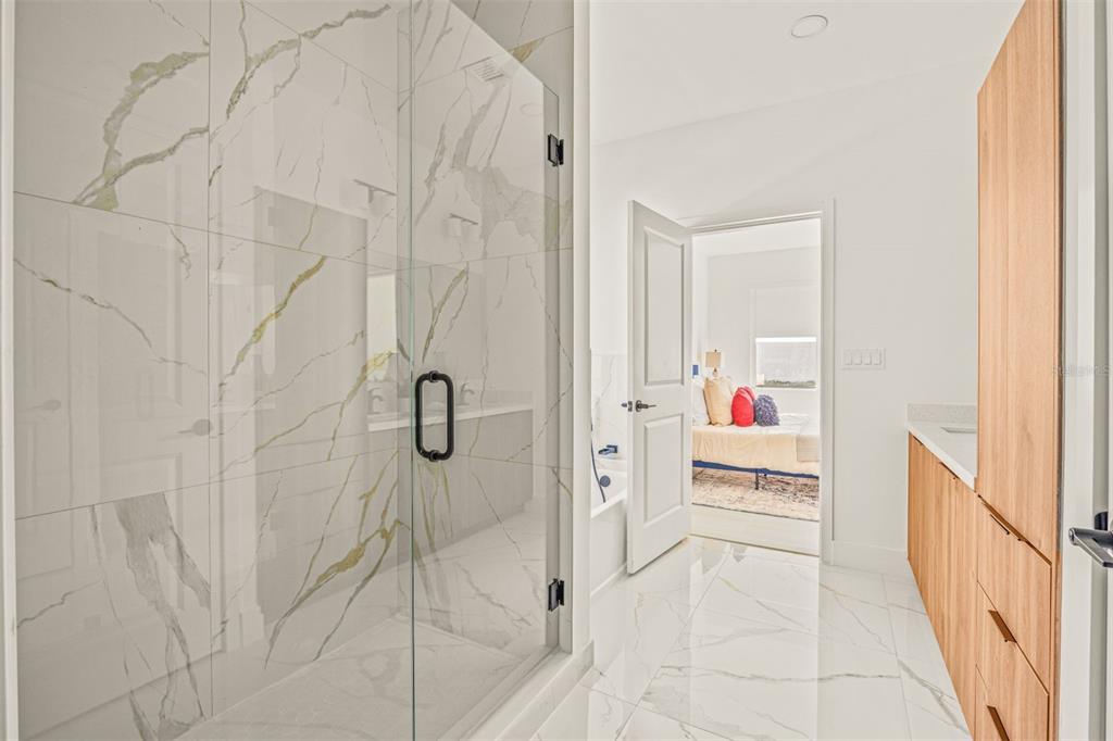 6336 Chorus Drive Mascotte, FL 34753 - Photo 11 of 21 a bathroom with a shower