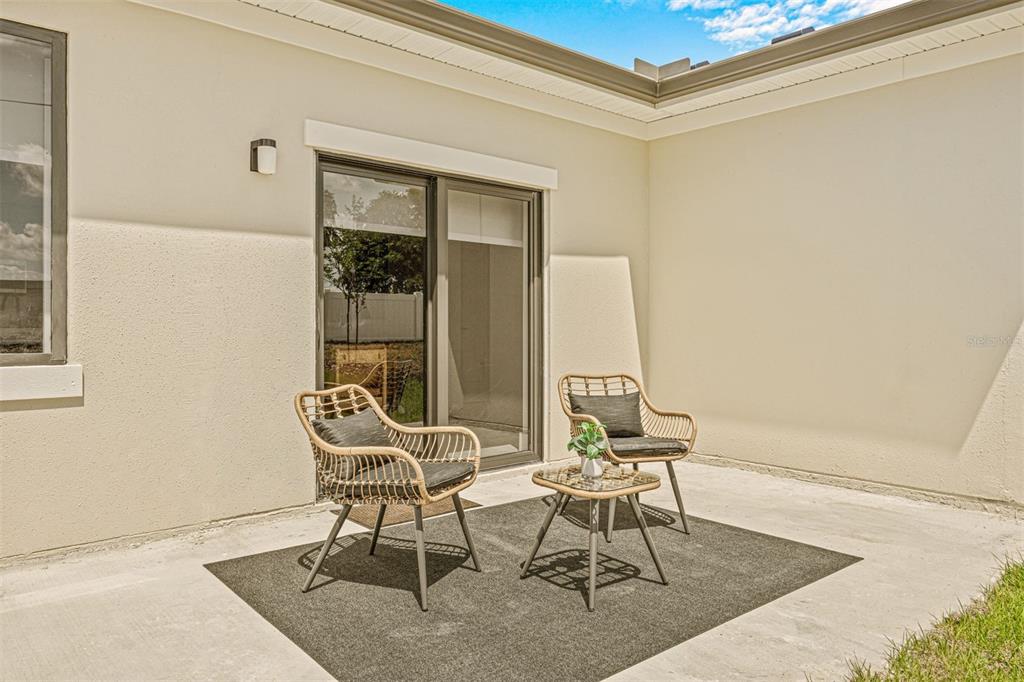 6336 Chorus Drive Mascotte, FL 34753 - Photo 18 of 21 a dining room with furniture and wooden floor