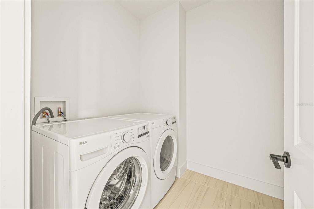6336 Chorus Drive Mascotte, FL 34753 - Photo 19 of 21 a utility room with dryer and washer