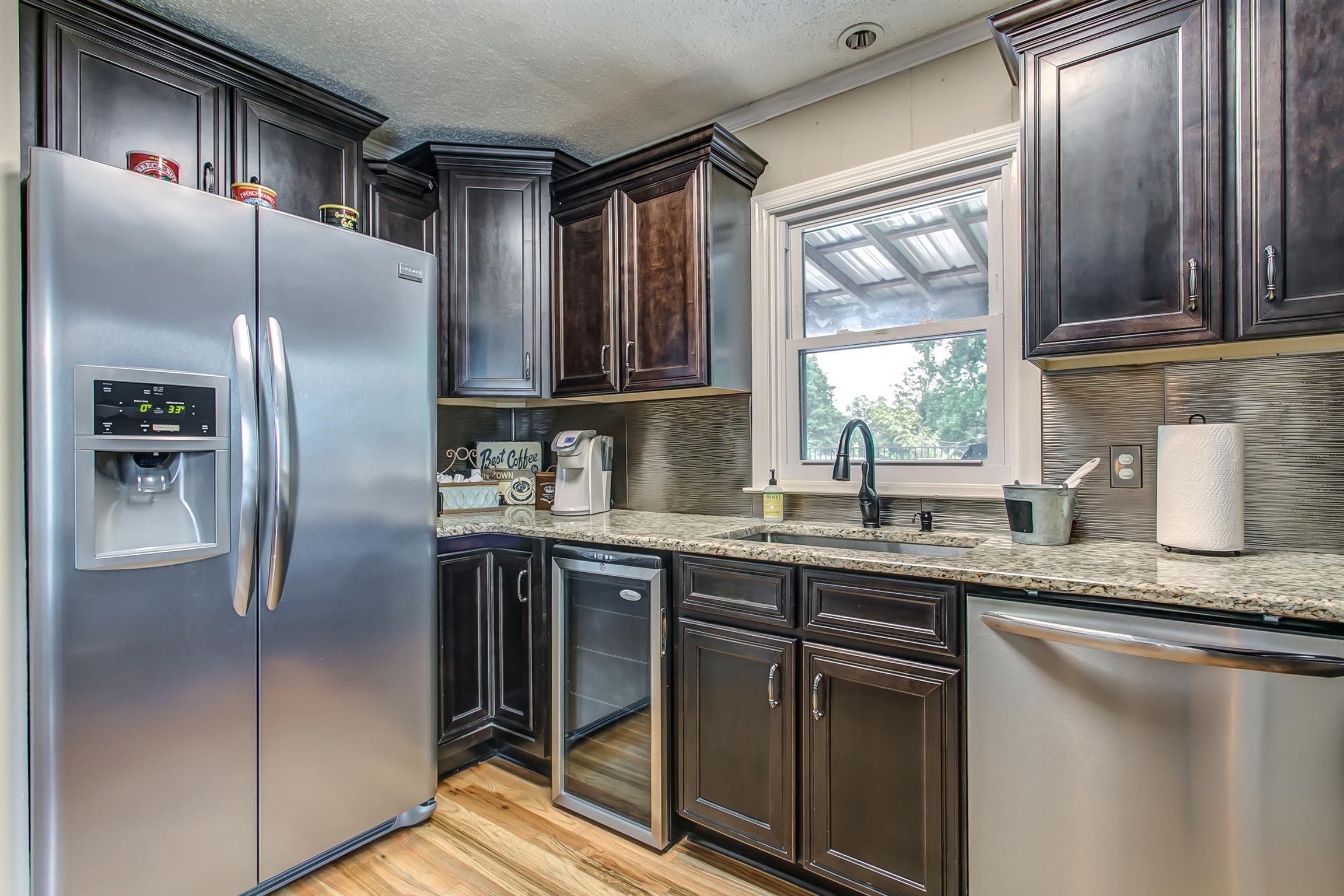 4432 Harpeth School Road Franklin, TN 37064 - Photo 10 of 30 The stainless appliances remain, including the refrigerator and note the wine refrigerator is not working and seller do not warrant.