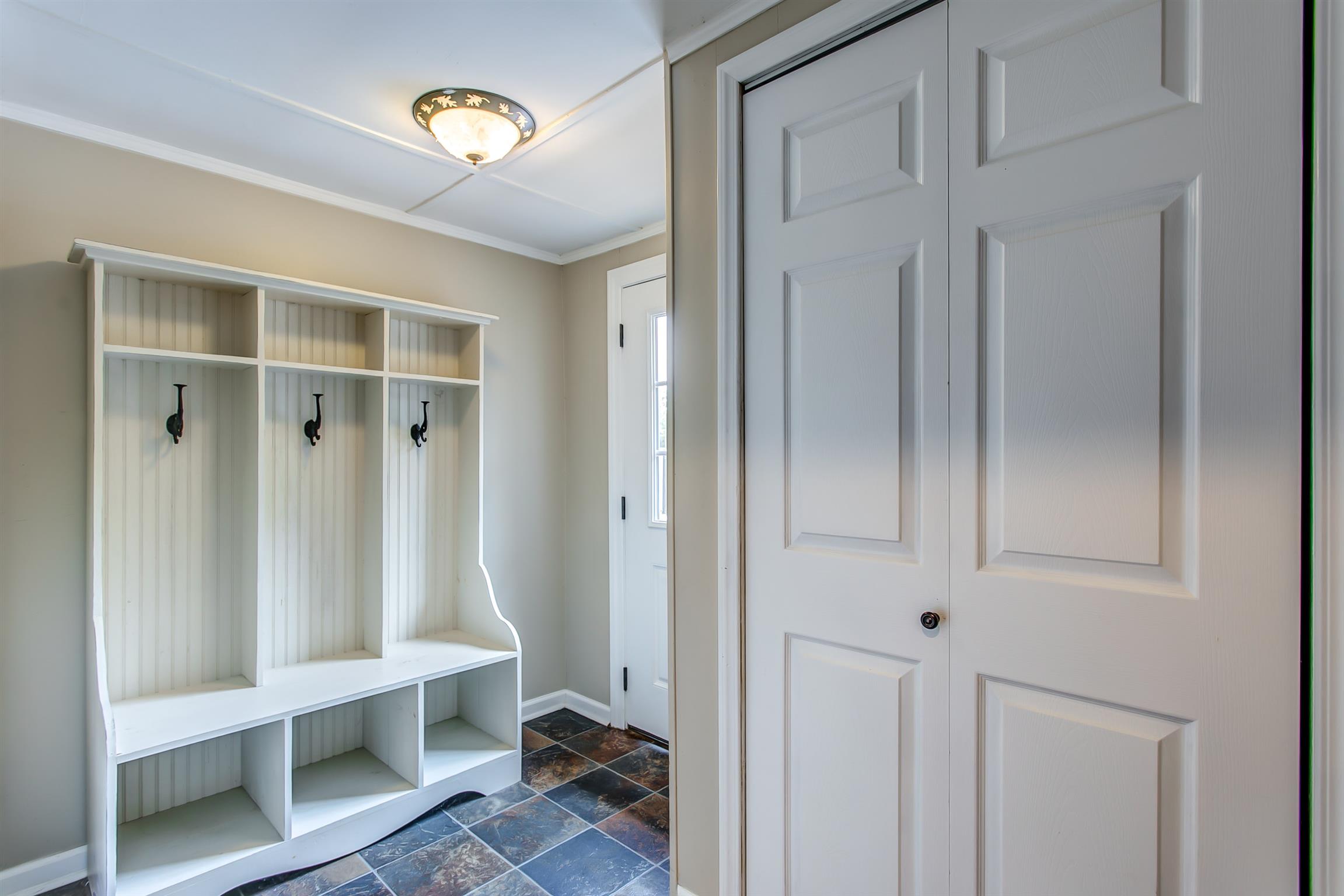 4432 Harpeth School Road Franklin, TN 37064 - Photo 13 of 30 An organizer's dream! Built-in storage gives you a designated place to hang coats and hide away shoes.