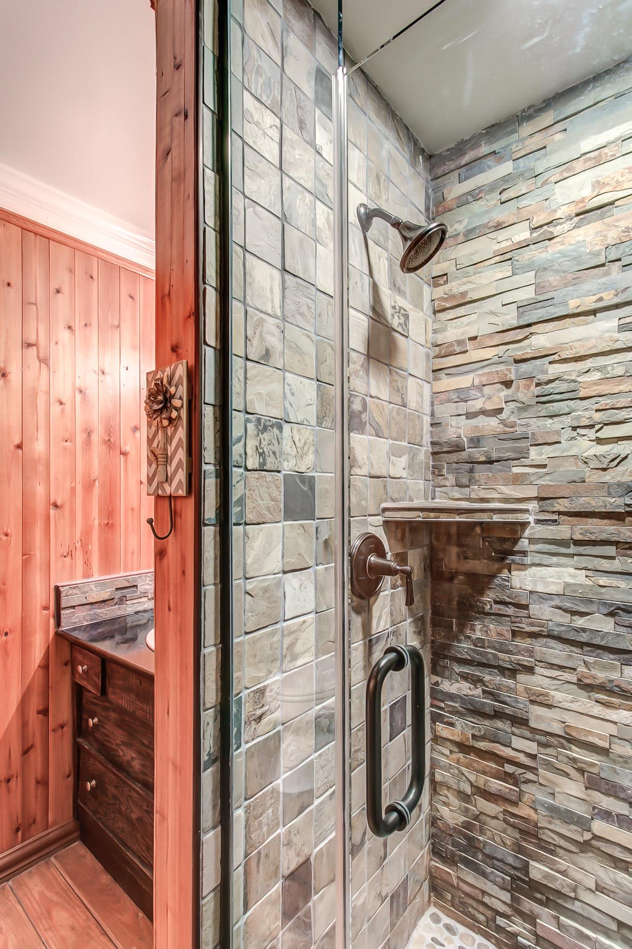 4432 Harpeth School Road Franklin, TN 37064 - Photo 19 of 30 Beautiful stone work covers all walls of the standing shower.