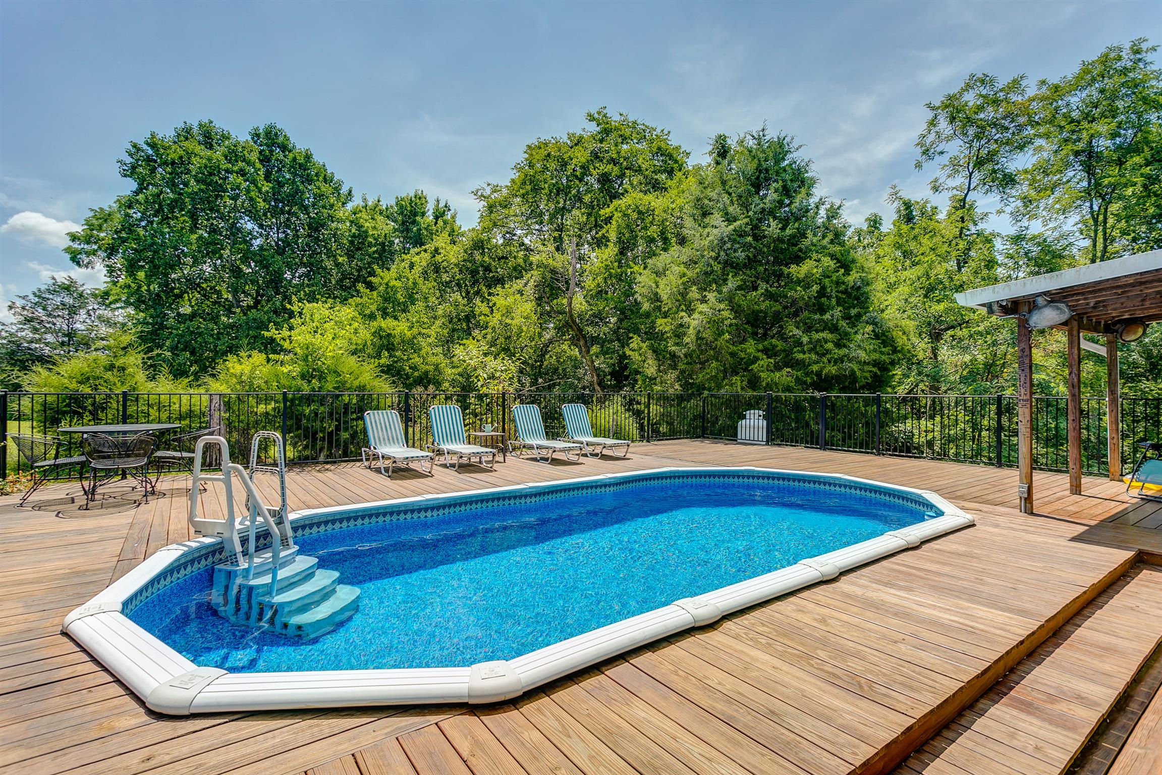 4432 Harpeth School Road Franklin, TN 37064 - Photo 20 of 30 Bring on the summer heat! Take a dip in the pool or catch a tan at the home's very own pool deck.