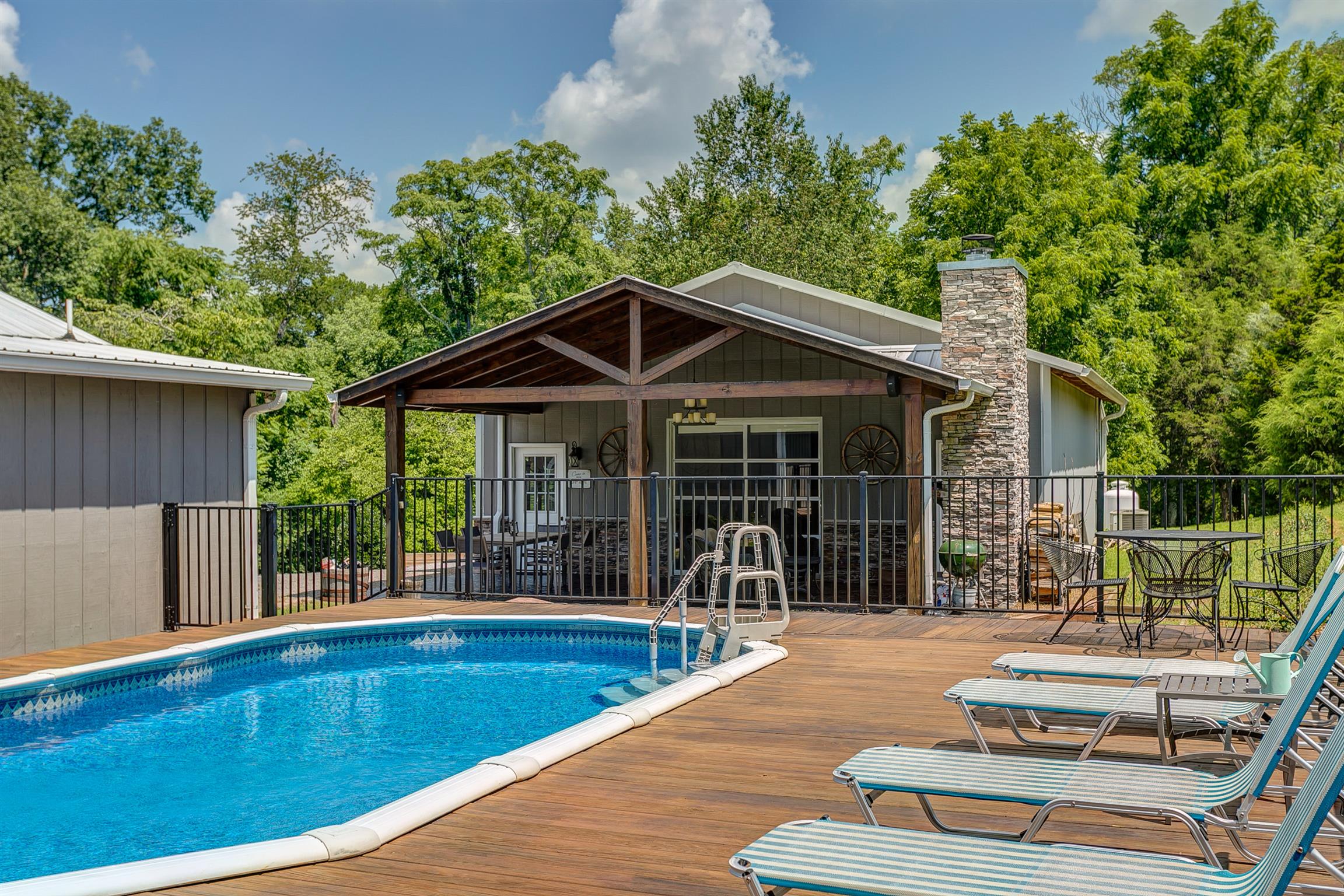4432 Harpeth School Road Franklin, TN 37064 - Photo 21 of 30 Equipped with wired, outdoor speakers, the home's outdoor space is ready for all your entertainment needs.