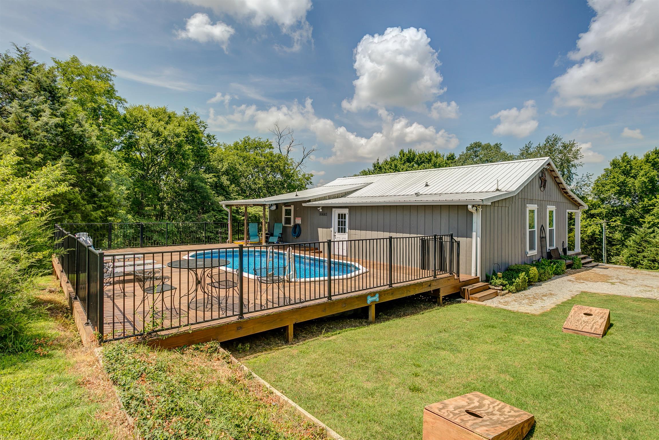 4432 Harpeth School Road Franklin, TN 37064 - Photo 22 of 30 The yard adjacent to the pool serves as the perfect location for yard games.