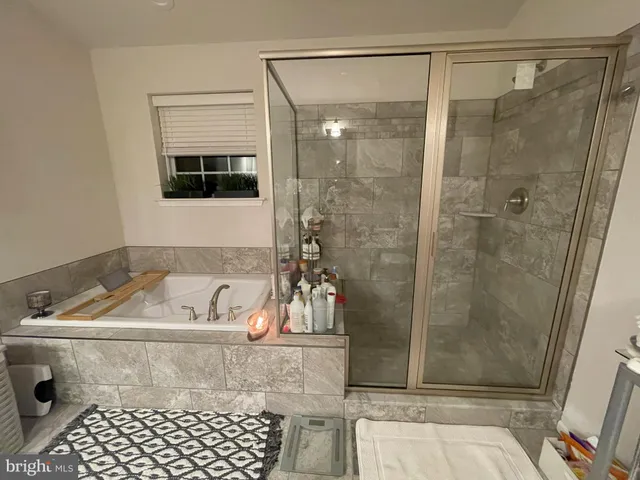 a room with furniture and a flat screen tv