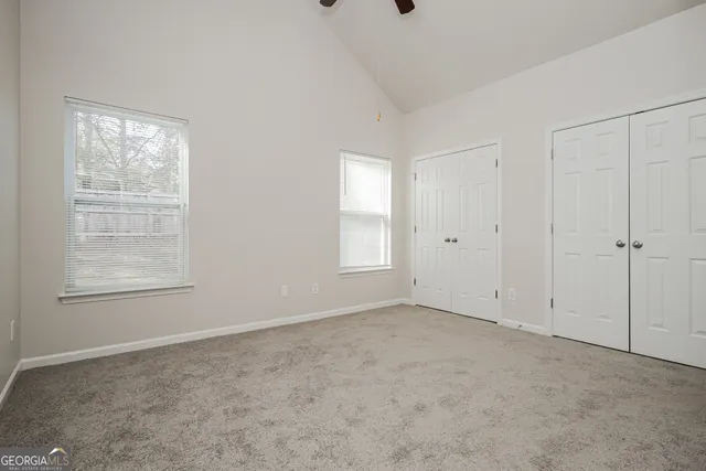 an empty room with windows