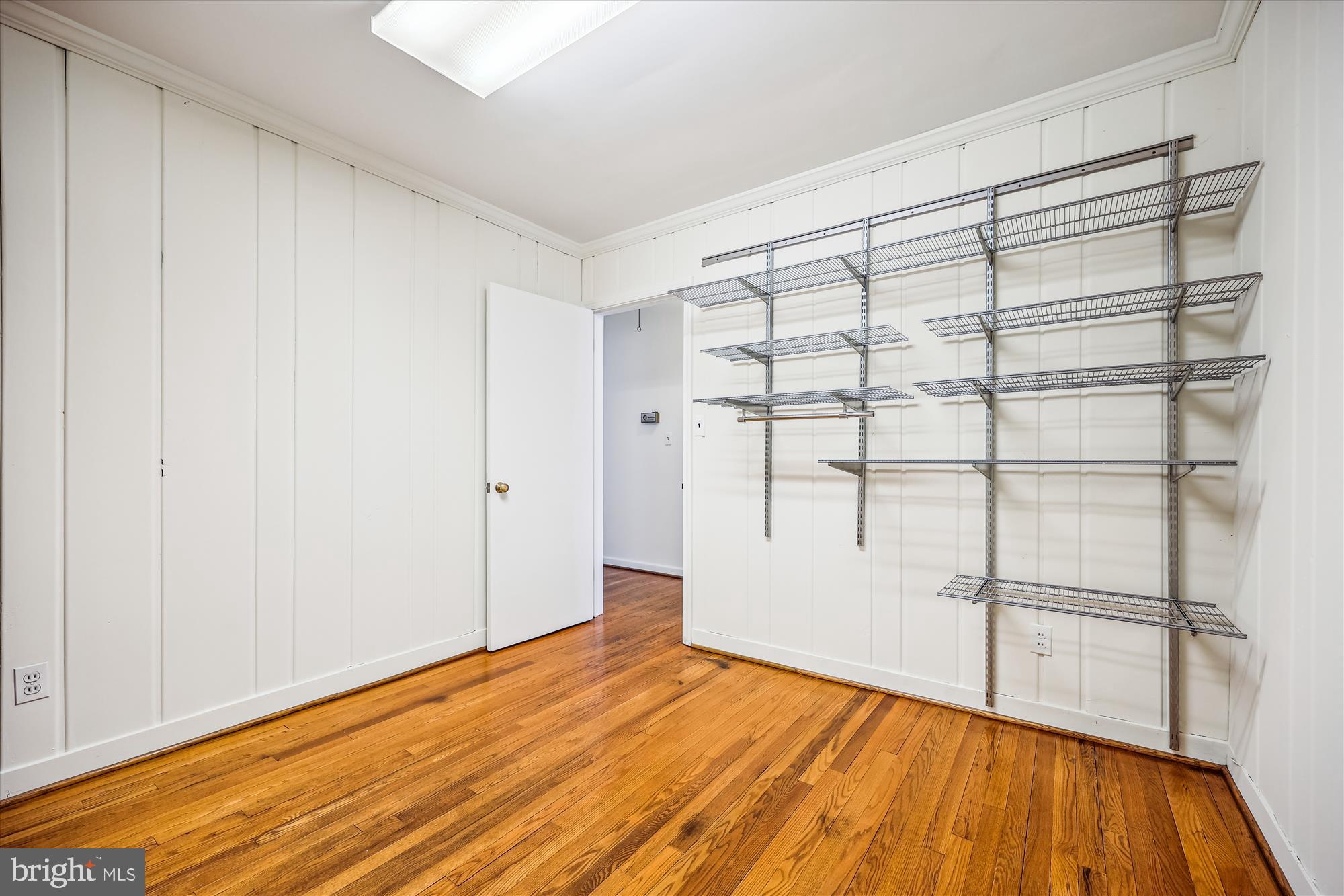 411 Pershing Drive Silver Spring, MD 20910 - Photo 41 of 64 a view of empty room with wooden floor