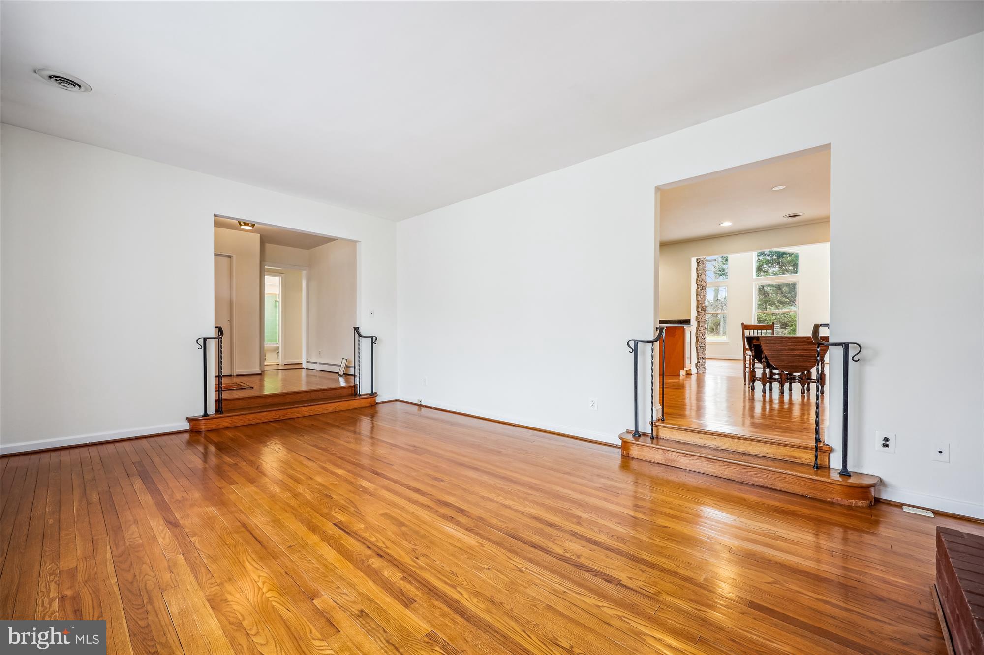 411 Pershing Drive Silver Spring, MD 20910 - Photo 10 of 64 a view of empty room with wooden floor
