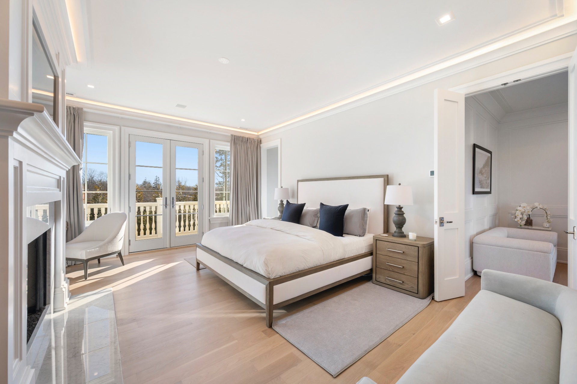 105 Hayground Road Water Mill, NY 11976 - Photo 10 of 24 a spacious bedroom with a bed and a large window