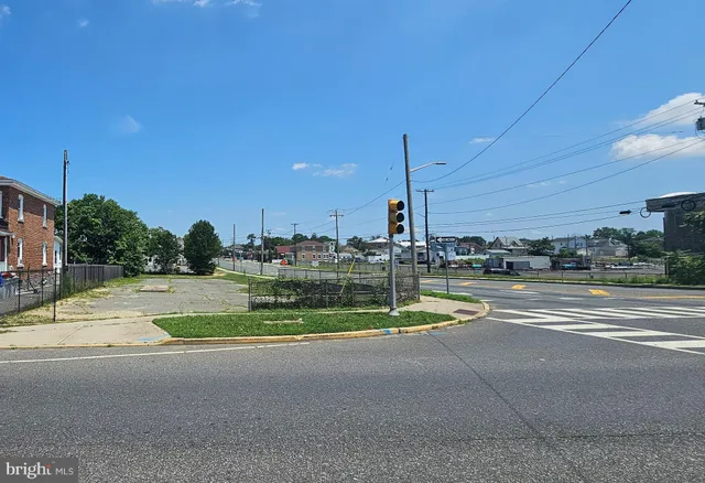 a view of swimming pool with outdoor seating and yard