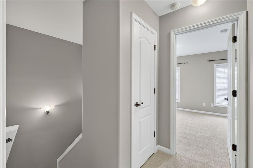 1186 Lake Point Way Suwanee, GA 30024 - Photo 18 of 35 a view of an empty room