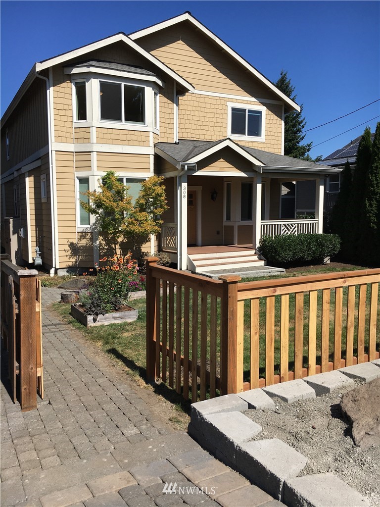 308 Northwest 89th Street Seattle, WA 98117 - Photo 1 of 9 a front view of a house with a yard