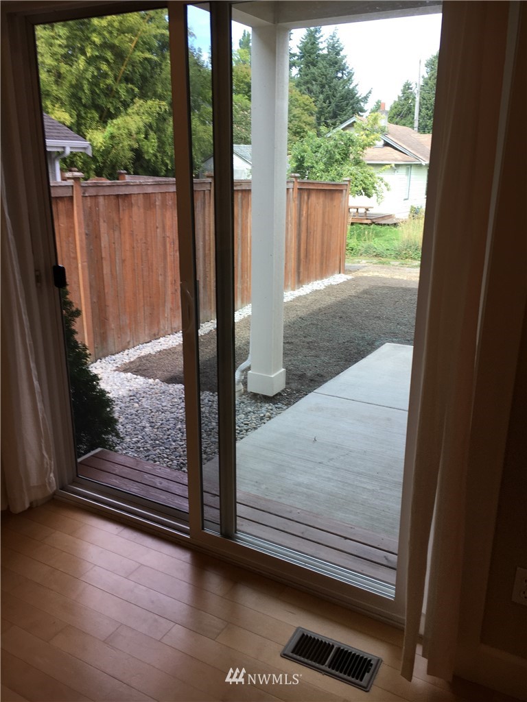 308 Northwest 89th Street Seattle, WA 98117 - Photo 4 of 9 a view of a glass door