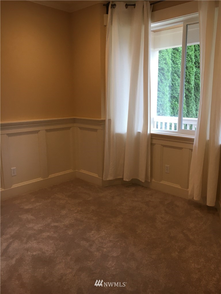 308 Northwest 89th Street Seattle, WA 98117 - Photo 7 of 9 a view of empty room with window