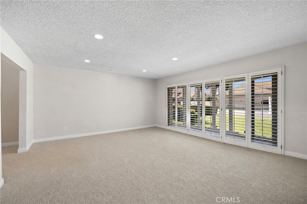 10202 Meredith Drive Huntington Beach, CA 92646 - Photo 6 of 13 Empty livingroom