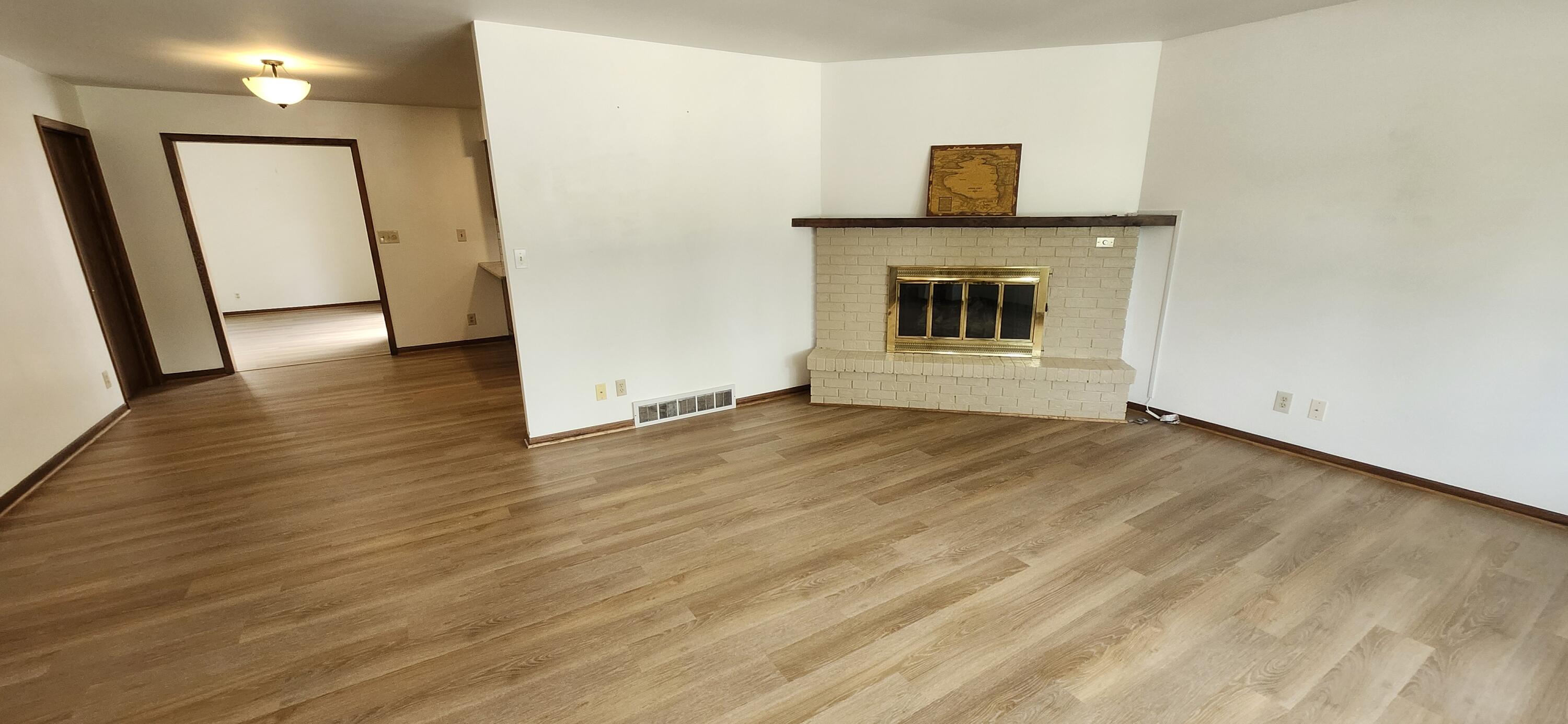 1707 Miller Road Lake Geneva, WI 53147 - Photo 3 of 28 Living room w/gas fireplace