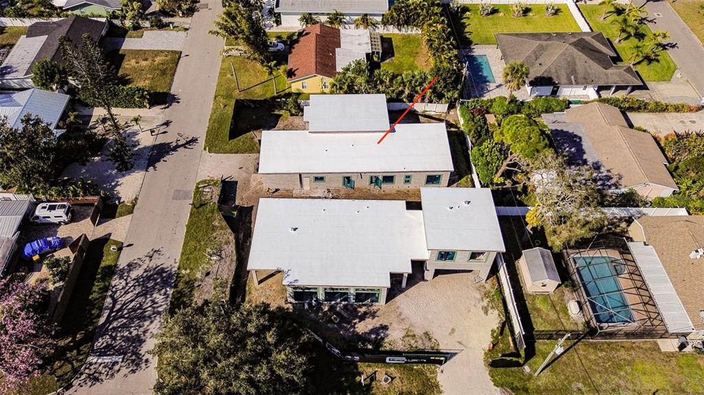 2069 Hibiscus Street Sarasota, FL 34239 - Photo 19 of 21 an aerial view of a house with yard and parking