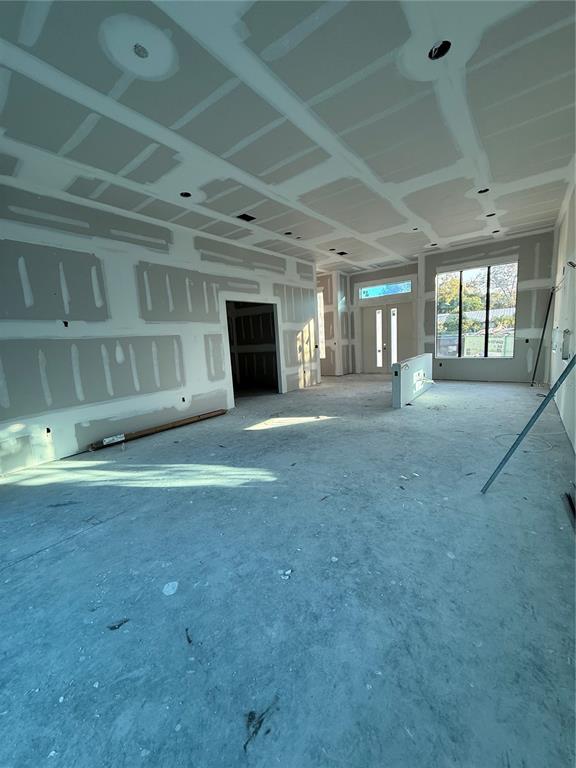 2069 Hibiscus Street Sarasota, FL 34239 - Photo 3 of 21 a view of an empty room with a fireplace and a window