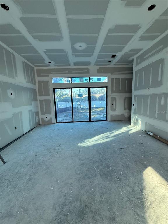 2069 Hibiscus Street Sarasota, FL 34239 - Photo 5 of 21 a view of an empty room with a windows