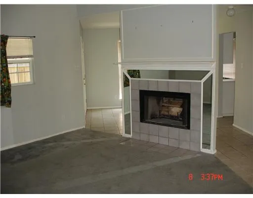 a living room with a fireplace