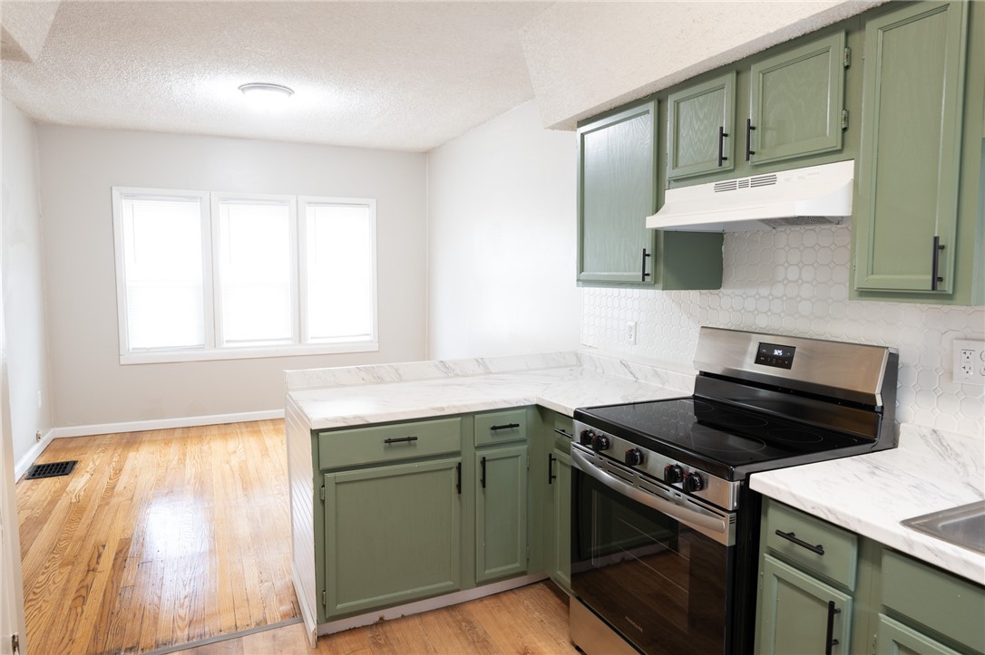 168 Ellicott Street Rochester, NY 14619 - Photo 5 of 18